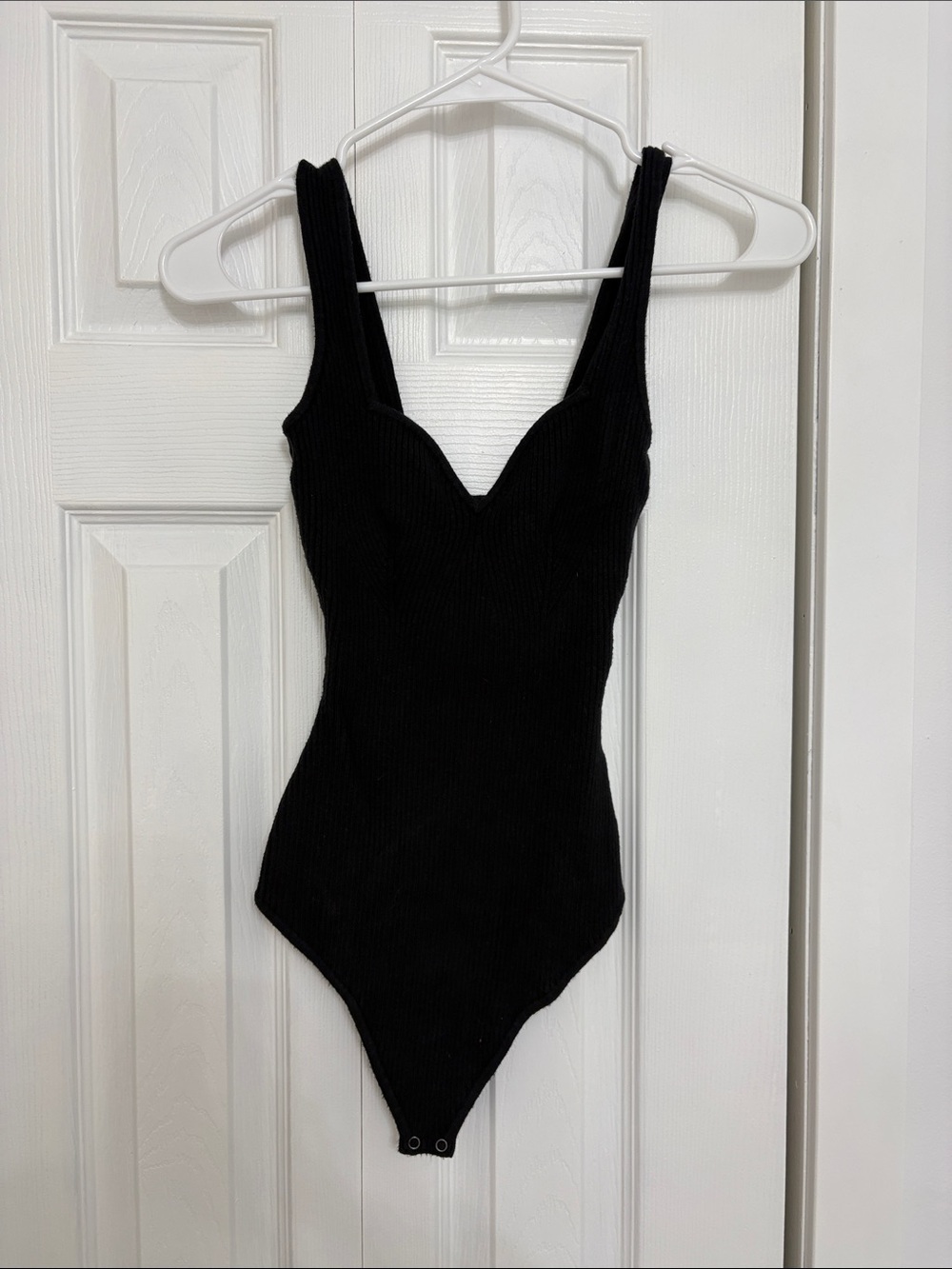 Black Ribbed One-Piece Bodysuit